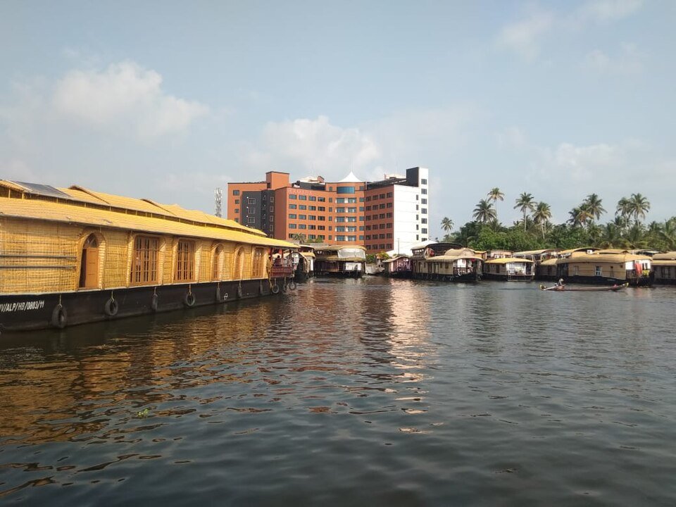 Houseboats moored on the backwaters at Alappuzha in Kerala